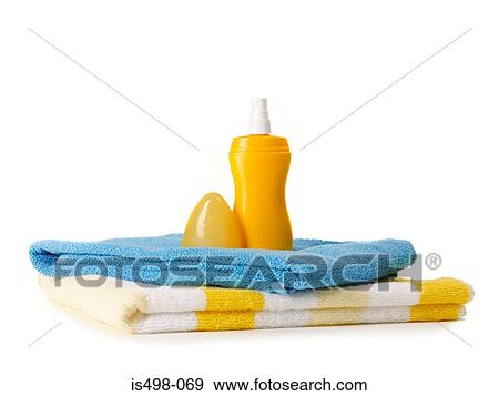 Beach towels and suntan lotion View Large Photo Image Stock Photo - Beach towels and suntan lotion. Fotosearch