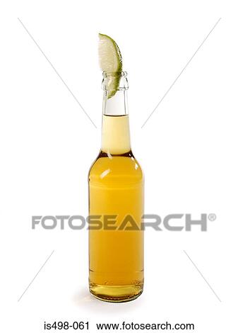 Bottle of lager and slice of lime View Large Photo Image Stock Image - Bottle of lager and slice of lime. Fotosearch