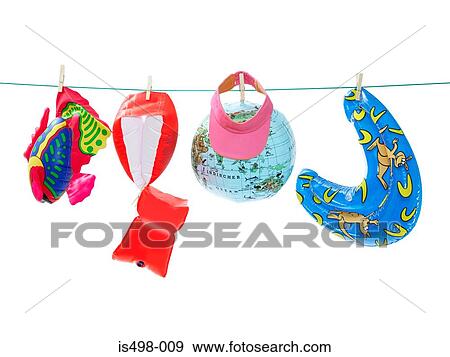 Inflatable toys on washing line View Large Photo Image Stock Photo - Inflatable toys on washing line. Fotosearch