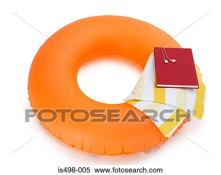 Rubber ring book headphones and beach towel View Large Photo Image Stock Photography - Rubber ring book headphones and beach towel. Fotosearch