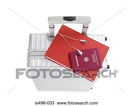 Suitcase book headphones and passport View Large Photo Image Stock Image - Suitcase book headphones and passport. Fotosearch