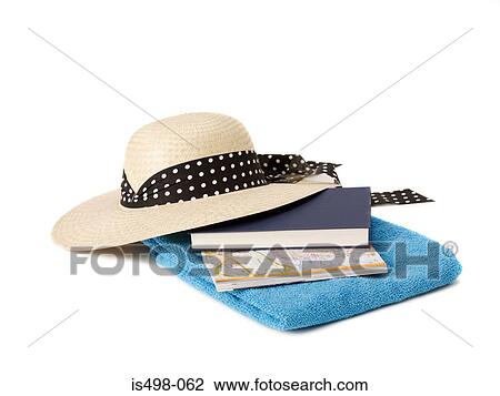 Sun hat beach towel book and map View Large Photo Image Stock Image - Sun hat beach towel book and map. Fotosearch