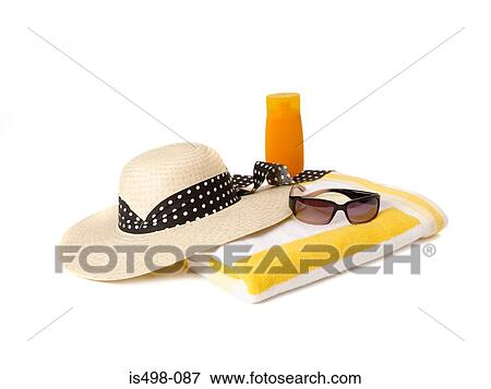 Sunglasses beach towel sunhat and suncream View Large Photo Image Stock Photo - Sunglasses beach towel sunhat and suncream. Fotosearch