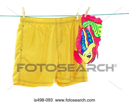 Trunks and an inflatable toy on a washing line View Large Photo Image Stock Image - Trunks and an inflatable toy on a washing line. Fotosearch
