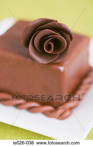 A chocolate rose on a cake View Large Photo Image Stock Photo - A chocolate rose on a cake. Fotosearch