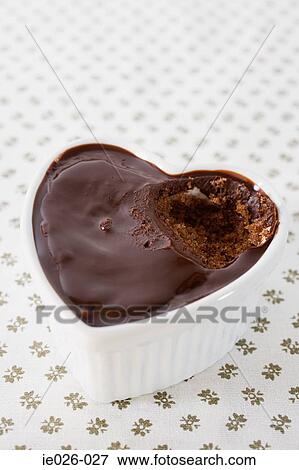 A heart shaped cake with a missing piece View Large Photo Image Stock Photo - A heart shaped cake with a missing piece. Fotosearch