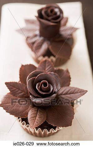 Cakes decorated with chocolate roses View Large Photo Image Stock Photo - Cakes decorated with chocolate roses. Fotosearch