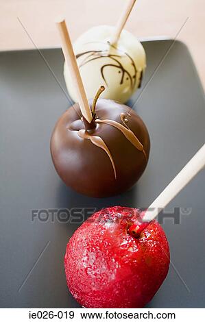 Stock Photo - Chocolate and toffee apples. Fotosearch