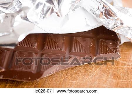 Chocolate bar and wrapper View Large Photo Image Stock Image - Chocolate bar and wrapper. Fotosearch