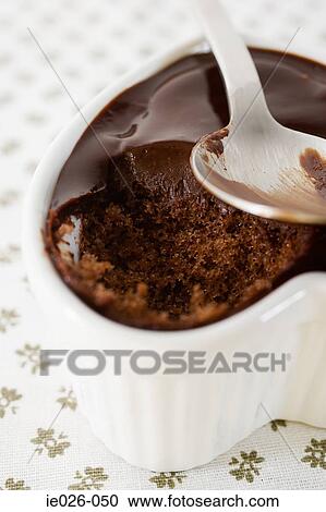 Chocolate cake and a spoon View Large Photo Image Stock Image - Chocolate cake and a spoon. Fotosearch