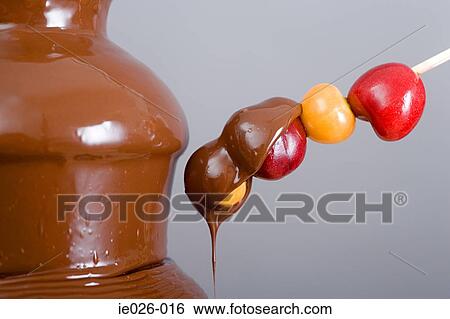 Fruit covered in chocolate View Large Photo Image Stock Photograph - Fruit covered in chocolate. Fotosearch