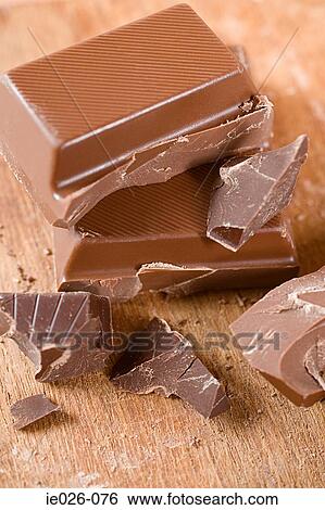 Pile of chocolate pieces View Large Photo Image Stock Photograph - Pile of chocolate pieces. Fotosearch