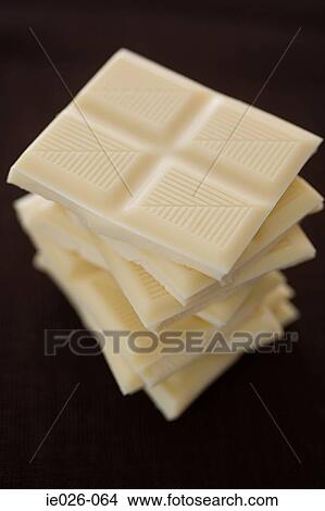 White chocolate bars in a pile View Large Photo Image Picture - White chocolate bars in a pile. Fotosearch