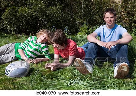 Friends listening to music View Large Photo Image Stock Image - Friends listening to music. Fotosearch