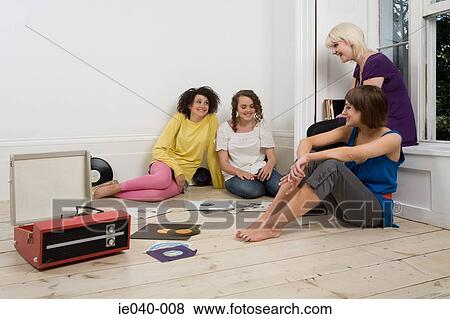 Friends listening to music View Large Photo Image Stock Photo - Friends listening to music. Fotosearch
