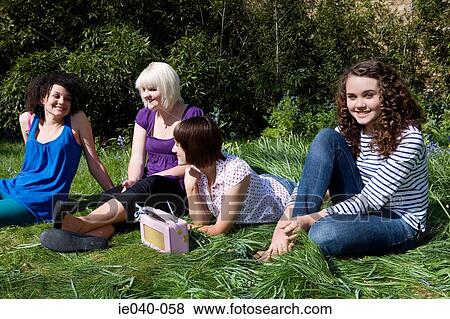 Friends listening to radio View Large Photo Image Stock Photo - Friends listening to radio. Fotosearch