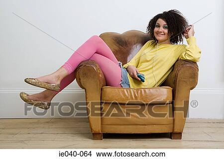 Teenage girl listening to music View Large Photo Image Picture - Teenage girl listening to music. Fotosearch