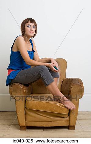 Teenage girl listening to music View Large Photo Image Stock Photography - Teenage girl listening to music. Fotosearch