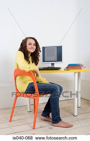 Stock Photo - Teenage girl using personal computer. Fotosearch