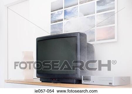Smoke coming out of a television View Large Photo Image Picture - Smoke coming out of a television. Fotosearch