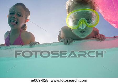 Stock Photo - Boy putting face underwater. Fotosearch