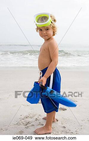 Boy with snorkeling gear View Large Photo Image Stock Photo - Boy with snorkeling gear. Fotosearch