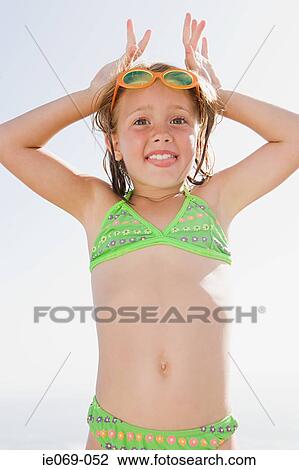 Stock Image - Girl having fun. Fotosearch