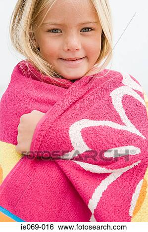 Girl in a towel View Large Photo Image Stock Photograph - Girl in a towel. Fotosearch