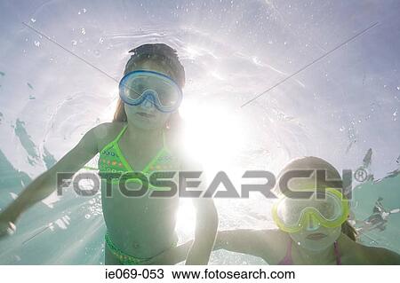 Girls swimming View Large Photo Image Stock Image - Girls swimming. Fotosearch