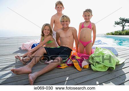 Kids by swimming pool View Large Photo Image Stock Image - Kids by swimming pool. Fotosearch