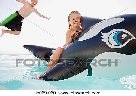 Kids in swimming pool View Large Photo Image Stock Image - Kids in swimming pool. Fotosearch