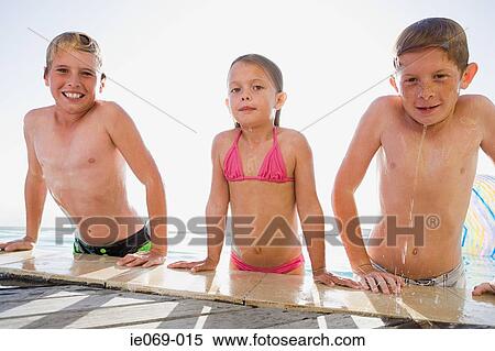 Kids in swimming pool View Large Photo Image Stock Photography - Kids in swimming pool. Fotosearch