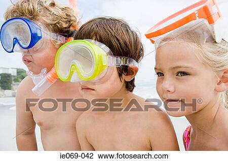 Kids wearing diving masks View Large Photo Image Stock Image - Kids wearing diving masks. Fotosearch