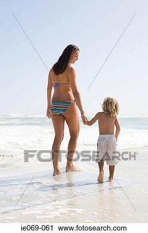 Mother and son by the sea View Large Photo Image Stock Image - Mother and son by the sea. Fotosearch