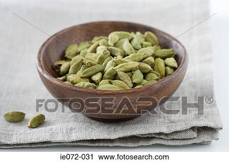 Cardamom seeds in a bowl View Large Photo Image Stock Image - Cardamom seeds in a bowl. Fotosearch
