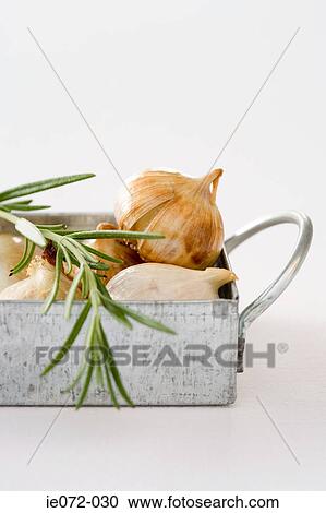 Rosemary and roasted garlic View Large Photo Image Stock Image - Rosemary and roasted garlic. Fotosearch
