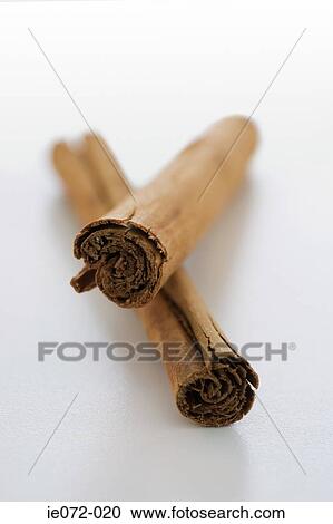 Two cinnamon sticks View Large Photo Image Stock Image - Two cinnamon sticks. Fotosearch