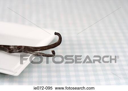 Vanilla bean is on a dish View Large Photo Image Stock Photography - Vanilla bean is on a dish. Fotosearch