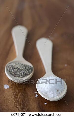 Wooden spoons sea salt and black pepper View Large Photo Image Stock Image - Wooden spoons sea salt and black pepper. Fotosearch
