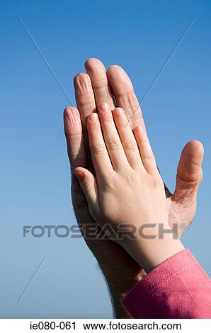 Childs hand on an adults hand View Large Photo Image Stock Image - Childs hand on an adults hand. Fotosearch