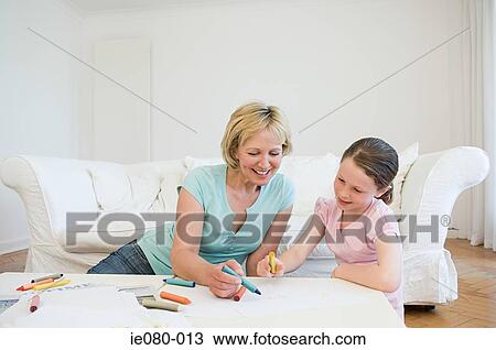 Mother and daughter drawing View Large Photo Image Stock Image - Mother and daughter drawing. Fotosearch