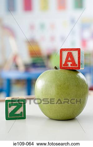 Apple and building blocks View Large Photo Image Picture - Apple and building blocks. Fotosearch
