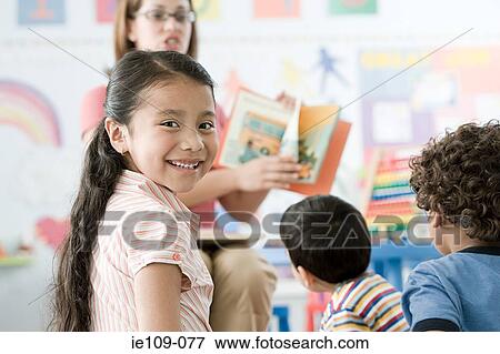Stock Photo - Children in a lesson. Fotosearch