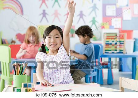 Girl raising arm View Large Photo Image Stock Photography - Girl raising arm. Fotosearch