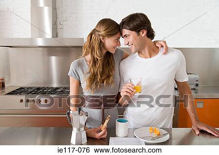Stock Photograph - A couple having breakfast. Fotosearch