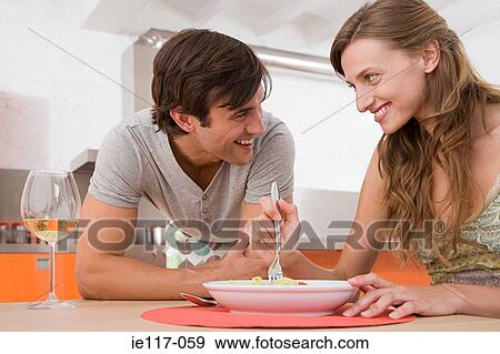 Stock Photo - A couple having dinner. Fotosearch