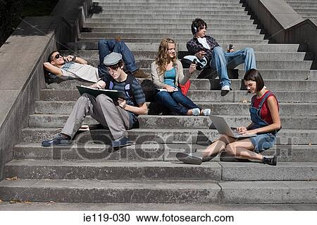 High school students sitting on steps View Large Photo Image Stock Image - High school students sitting on steps. Fotosearch
