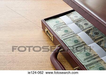A briefcase filled wih banknotes View Large Photo Image Stock Image - A briefcase filled wih banknotes. Fotosearch