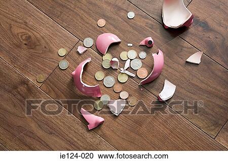 A smashed piggy bank View Large Photo Image Stock Image - A smashed piggy bank. Fotosearch