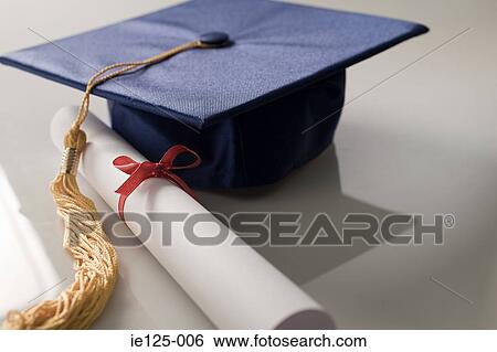 Scroll and mortarboard View Large Photo Image Stock Photograph - Scroll and mortarboard. Fotosearch